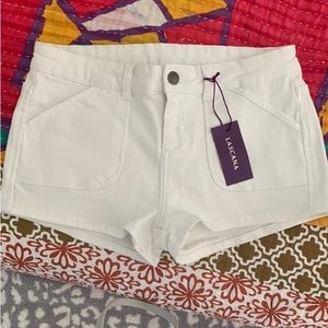 Brand new white denim shorts, runs small.